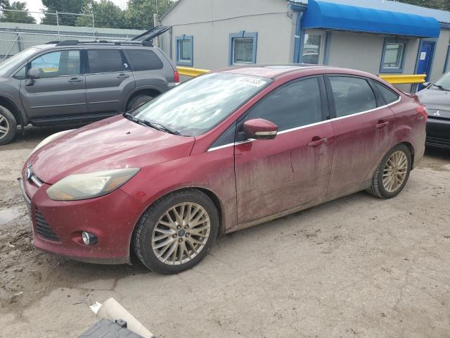 FORD FOCUS TITANIUM 2014 with VIN 1FADP3J28EL431275 - Photo from auction