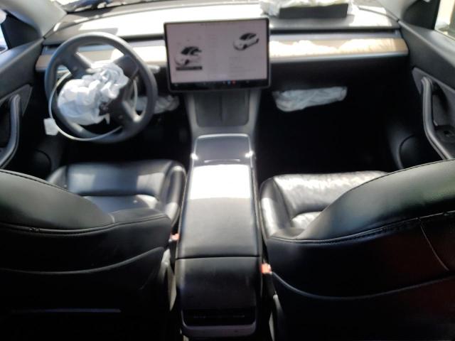 Photo 8 from auction – 2022 TESLA MODEL Y with VIN 7SAYGDEE7NF352529