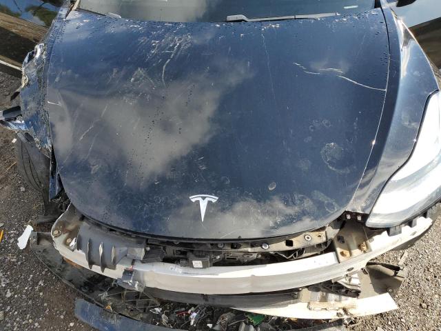 Photo 11 from auction – 2018 TESLA MODEL 3 with VIN 5YJ3E1EA9JF023642