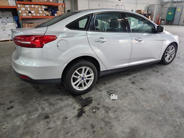 Photo 3 from auction – 2016 FORD FOCUS SE with VIN 1FADP3F22GL365429