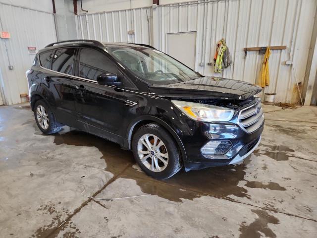 Foto 4 de la subasta – 2017 FORD ESCAPE SE con VIN 1FMCU0GD2HUD09446