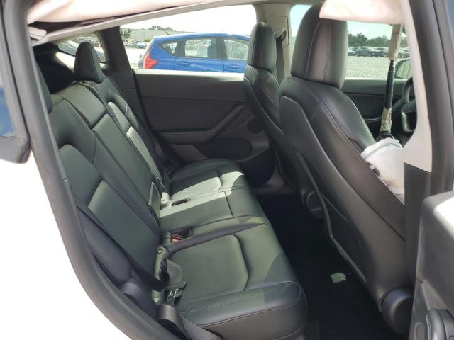 Photo 11 from auction – 2022 TESLA MODEL Y with VIN 7SAYGDEE5NF394553