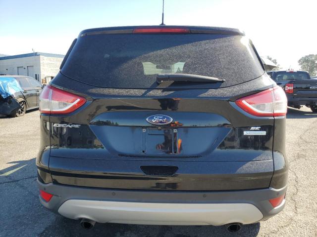 Photo 6 from auction – 2016 FORD ESCAPE SE with VIN 1FMCU0GX1GUB40836