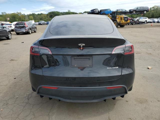Photo 6 from auction – 2023 TESLA MODEL Y with VIN 7SAYGAEE6PF860007