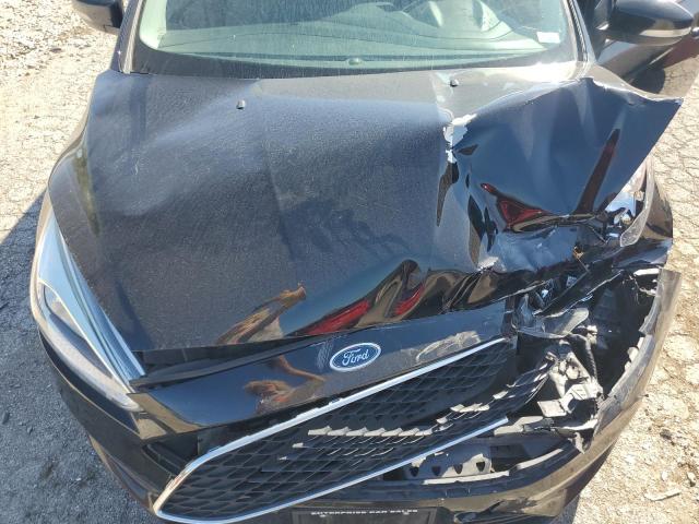 Photo 11 from auction – 2017 FORD FOCUS SE with VIN 1FADP3K29HL231296