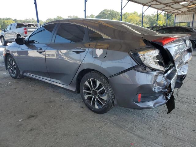 Photo 2 from auction – 2018 HONDA CIVIC LX with VIN 19XFC2E55JE026913