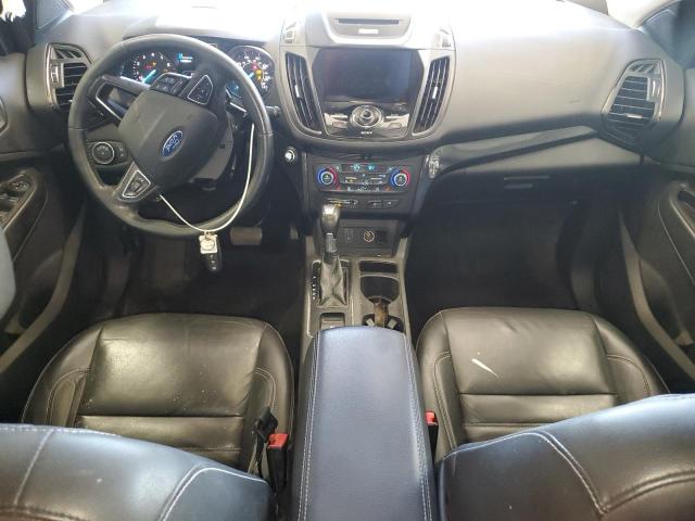 Photo 8 from auction – 2017 FORD ESCAPE TITANIUM with VIN 1FMCU9J98HUD31296