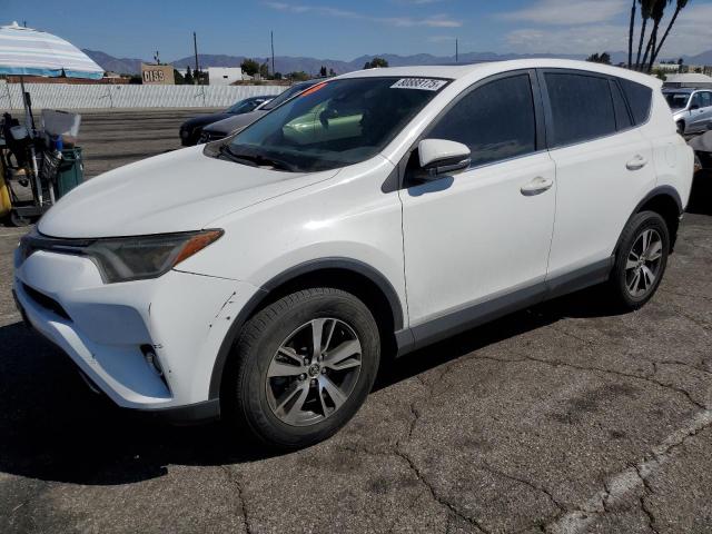 TOYOTA RAV4 XLE 2017 with VIN JTMWFREV2HJ718284 - Photo from auction
