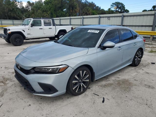 HONDA CIVIC EX 2023 with VIN 2HGFE1F71PH302541 - Photo from auction