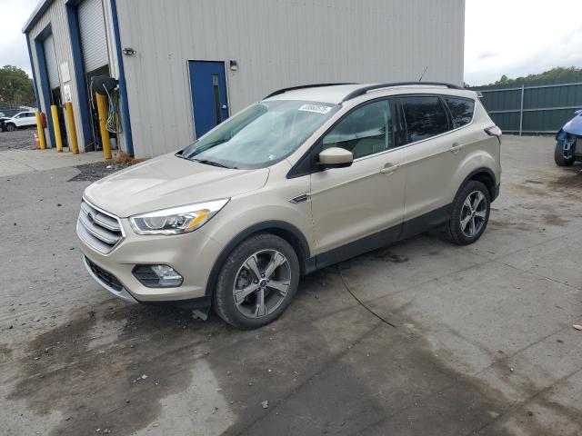 FORD ESCAPE SE 2017 with VIN 1FMCU9GD0HUD81217 - Photo from auction