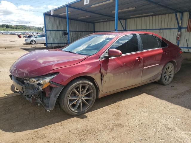 TOYOTA CAMRY LE 2017 with VIN 4T1BF1FKXHU676400 - Photo from auction