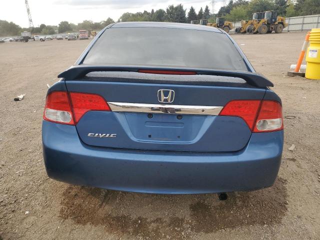 Photo 6 from auction – 2011 HONDA CIVIC LX with VIN 19XFA1F5XBE047790