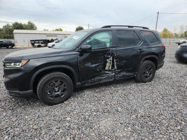 HONDA PILOT TRAI 2023 with VIN 5FNYG1H64PB046004 - Photo from auction