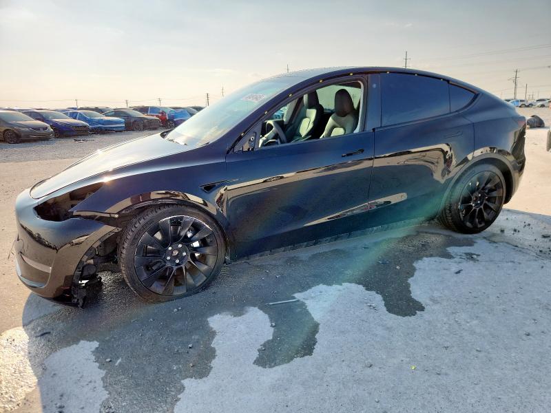 TESLA MODEL Y 2023 with VIN 7SAYGDEE0PA107782 - Photo from auction