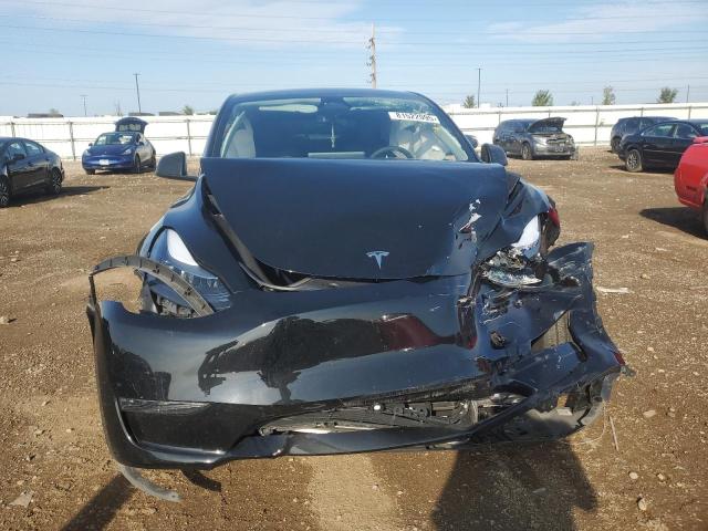 Photo 5 from auction – 2025 TESLA Y with VIN 7SAYGDED9SF238308