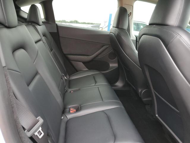 Photo 11 from auction – 2023 TESLA MODEL Y with VIN 7SAYGDEF1PF766191
