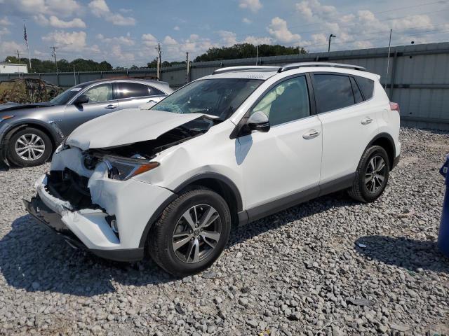 TOYOTA RAV4 XLE 2017 with VIN JTMWFREV9HD103746 - Photo from auction