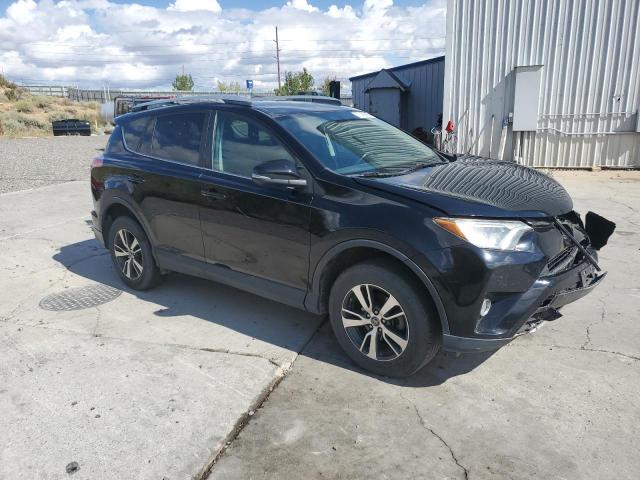 Photo 4 from auction – 2016 TOYOTA RAV4 XLE with VIN 2T3RFREV0GW485308