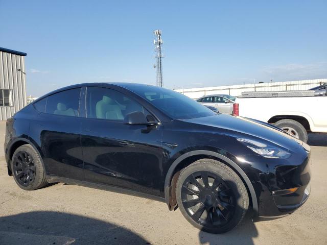 Photo 4 from auction – 2022 TESLA MODEL Y with VIN 7SAYGAEE2NF417561