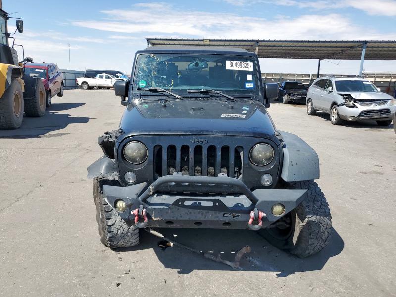 Photo 5 from auction – 2015 JEEP WRANGLER U with VIN 1C4BJWDG0FL697032