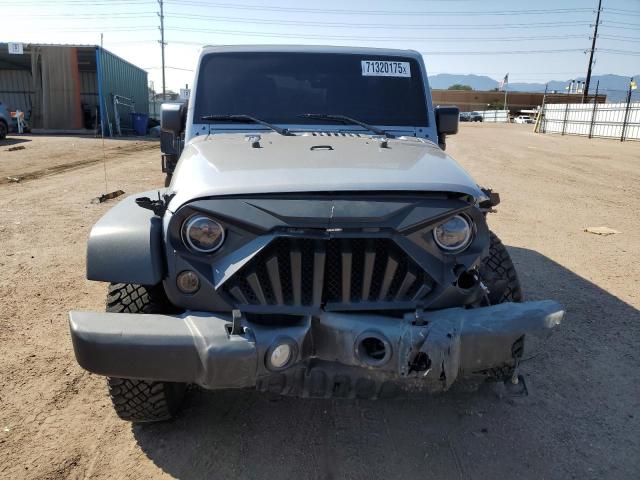 Photo 5 from auction – 2016 JEEP WRANGLER U with VIN 1C4BJWFG8GL189499