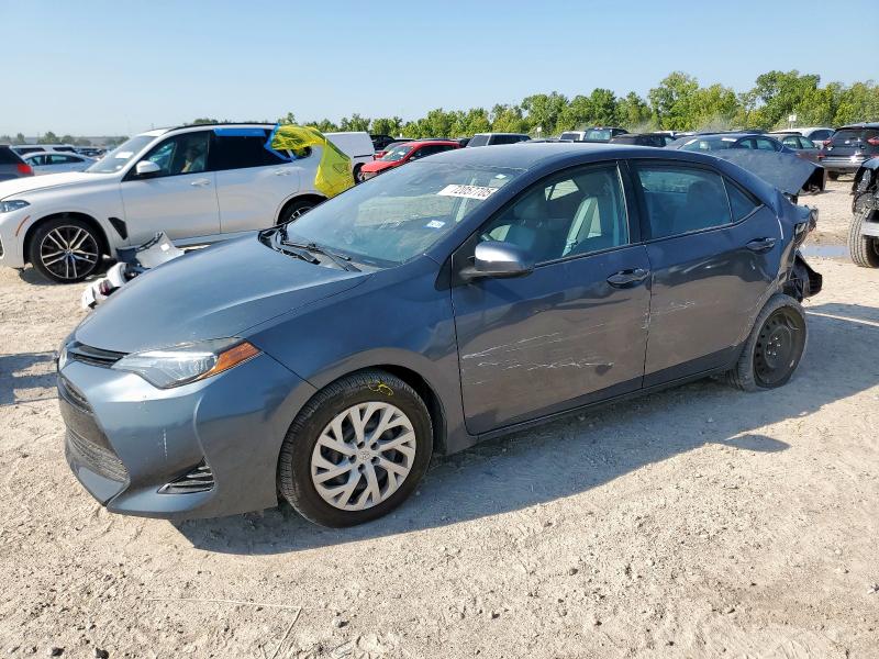 TOYOTA COROLLA L 2019 with VIN 5YFBURHE1KP942052 - Photo from auction