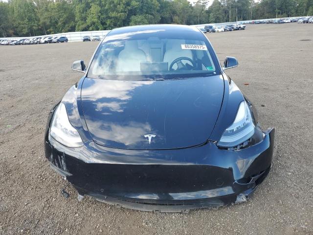 Photo 5 from auction – 2018 TESLA MODEL 3 with VIN 5YJ3E1EBXJF074043