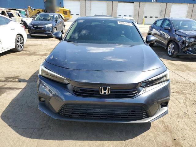 Photo 5 from auction – 2023 HONDA CIVIC TOUR with VIN 2HGFE1F92PH315428