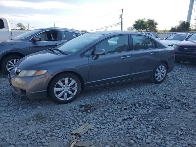 HONDA CIVIC LX 2011 with VIN 2HGFA1F56BH527850 - Photo from auction