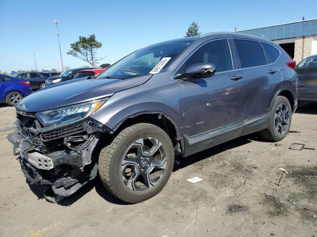 HONDA CR-V TOURING 2017 with VIN 5J6RW2H90HL000511 - Photo from auction