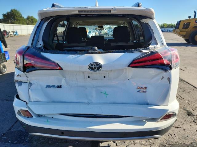 Photo 6 from auction – 2017 TOYOTA RAV4 XLE with VIN JTMRFREV3HJ106978