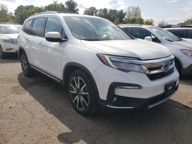 Photo 4 from auction – 2020 HONDA PILOT TOURING with VIN 5FNYF6H91LB004359