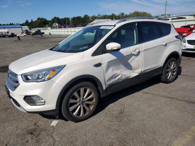 FORD ESCAPE TITANIUM 2017 with VIN 1FMCU9JD4HUC58075 - Photo from auction