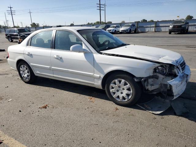 Photo 4 from auction – 2005 KIA OPTIMA LX with VIN KNAGD126155389037