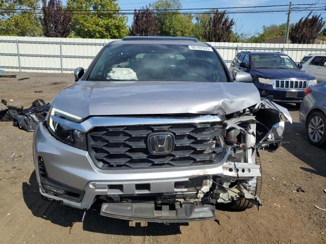 Photo 5 from auction – 2022 HONDA PASSPORT E with VIN 5FNYF8H50NB031970