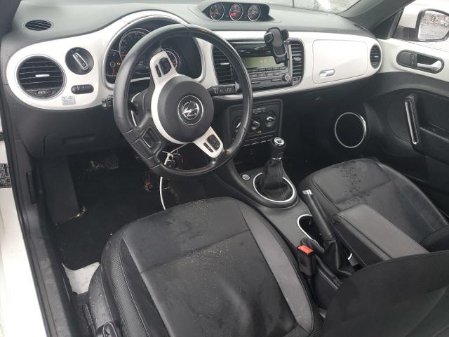 Photo 8 from auction – 2013 VOLKSWAGEN BEETLE with VIN 3VWRL7AT1DM663576