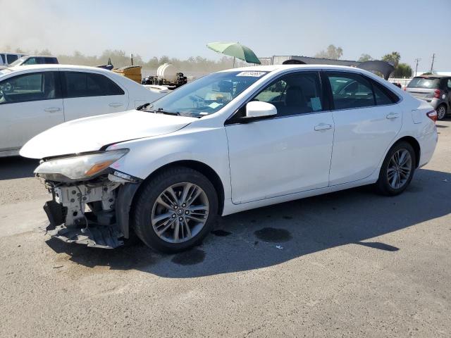 TOYOTA CAMRY LE 2017 with VIN 4T1BF1FK0HU747667 - Photo from auction