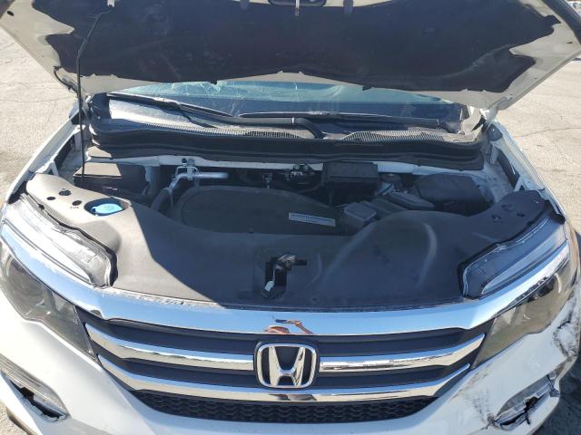 Photo 12 from auction – 2018 HONDA PILOT EXL with VIN 5FNYF6H50JB061789