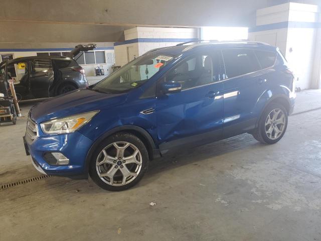 FORD ESCAPE TITANIUM 2017 with VIN 1FMCU0J90HUC30930 - Photo from auction