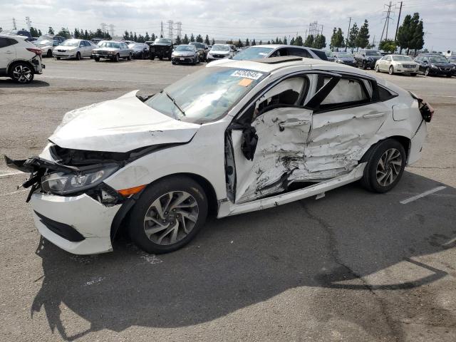 HONDA CIVIC EX 2018 with VIN 2HGFC2F76JH518369 - Photo from auction