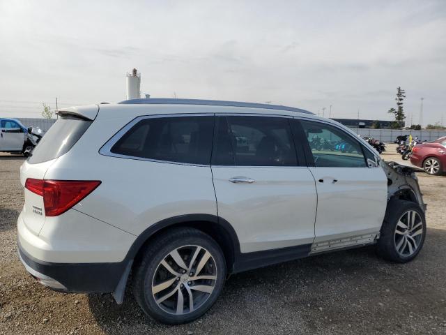 Photo 3 from auction – 2017 HONDA PILOT TOURING with VIN 5FNYF6H94HB095974