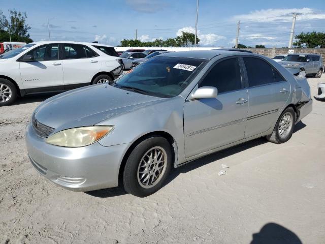 TOYOTA CAMRY LE 2002 with VIN 4T1BE32K12U562006 - Photo from auction