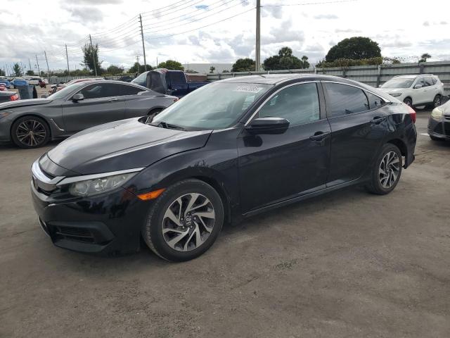 Photo 1 from auction – 2018 HONDA CIVIC EX with VIN 19XFC2F7XJE201995