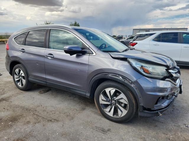 Photo 4 from auction – 2015 HONDA CR-V TOURI with VIN 5J6RM3H91FL025023