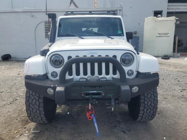 Photo 5 from auction – 2014 JEEP WRANGLER U with VIN 1C4BJWFG1EL120568