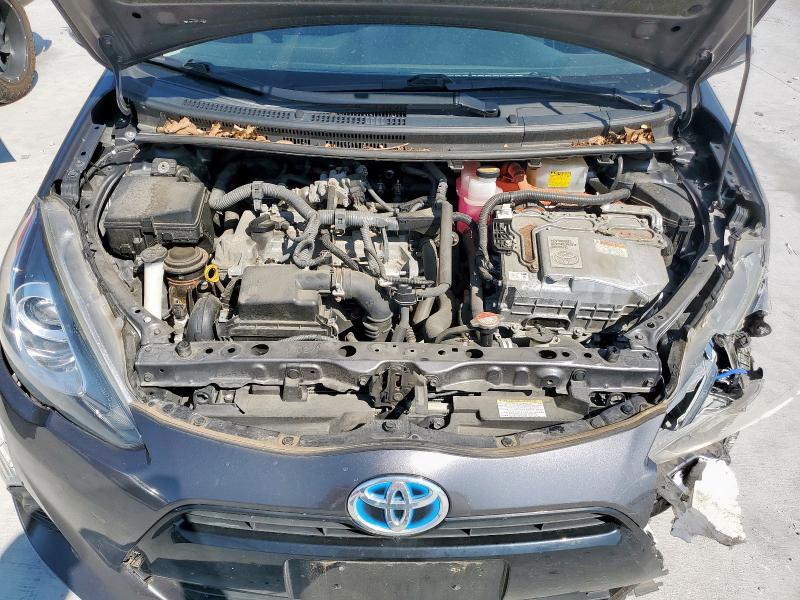Photo 11 from auction – 2015 TOYOTA PRIUS C with VIN JTDKDTB39F1108853