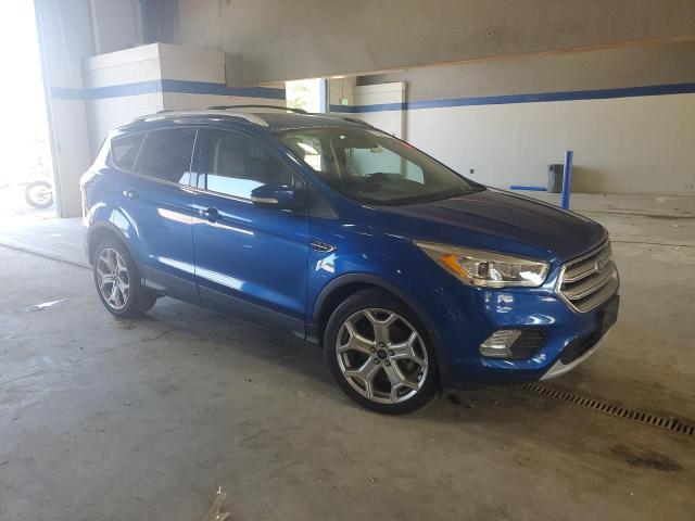 Photo 4 from auction – 2017 FORD ESCAPE TITANIUM with VIN 1FMCU0J90HUC30930