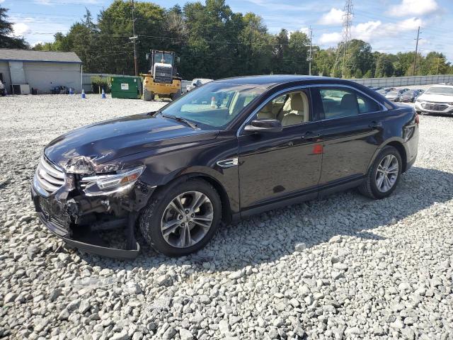 FORD TAURUS SEL 2013 with VIN 1FAHP2E84DG168459 - Photo from auction