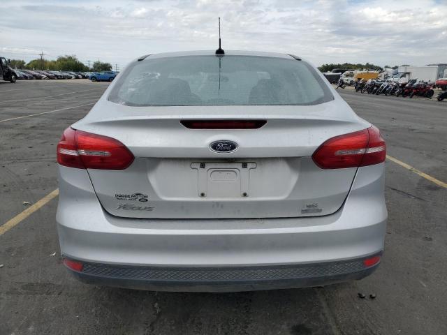 Foto 6 de la subasta – 2018 FORD FOCUS SE con VIN 1FADP3FE5JL278237