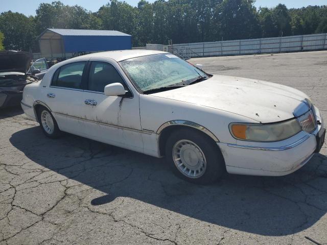 Photo 4 from auction – 2001 LINCOLN TOWN CAR E with VIN 1LNHM81W81Y697408